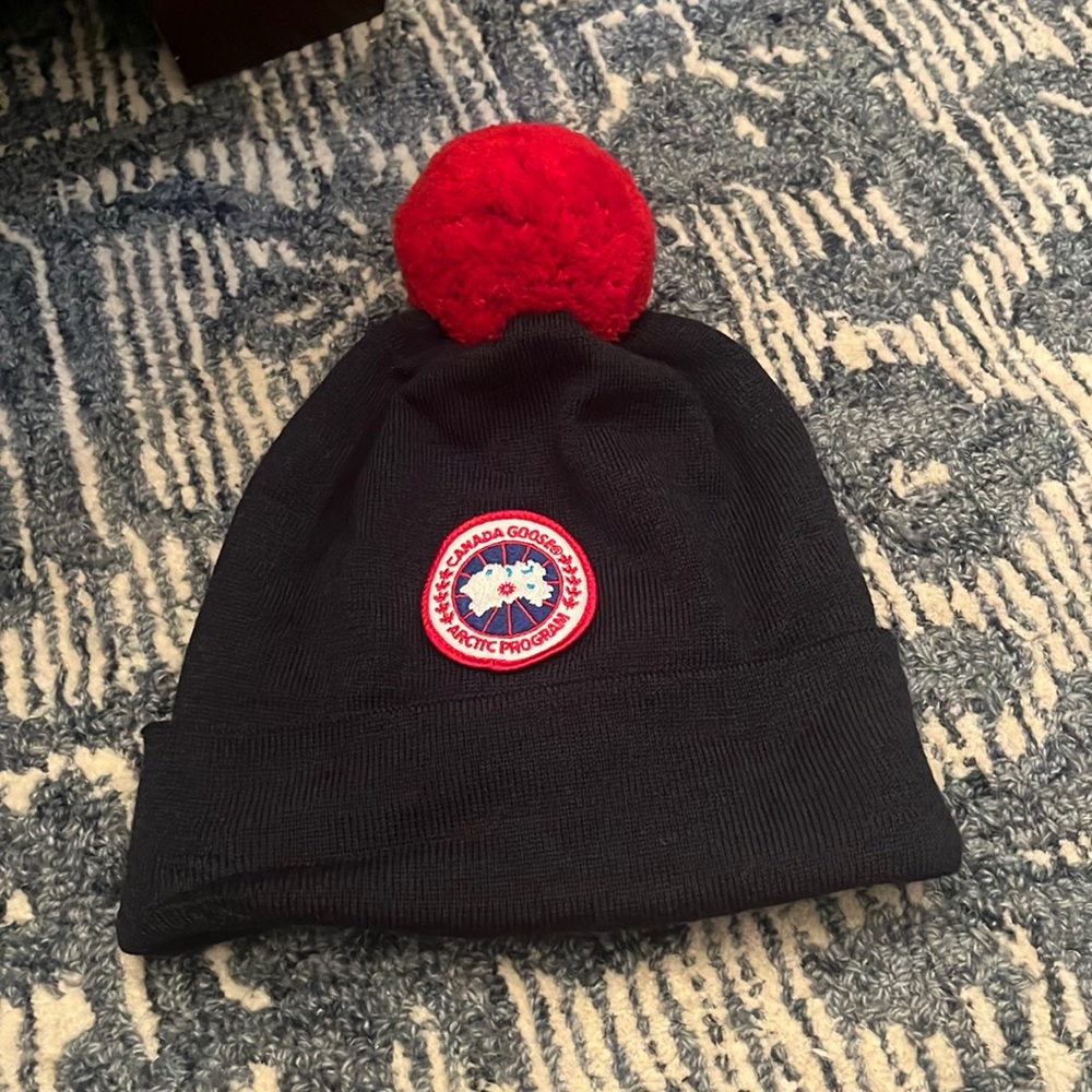 Canada goose beanie with red pom-pom